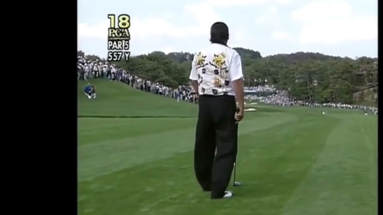 ジャンボ尾崎プロの強烈なアゲンストを技術とパワーでロングを2オンさせたショット！