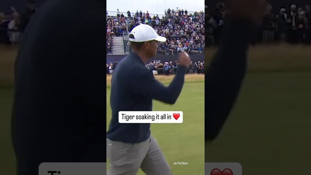 He shares a special moment with fans as he walks up 18 fairway