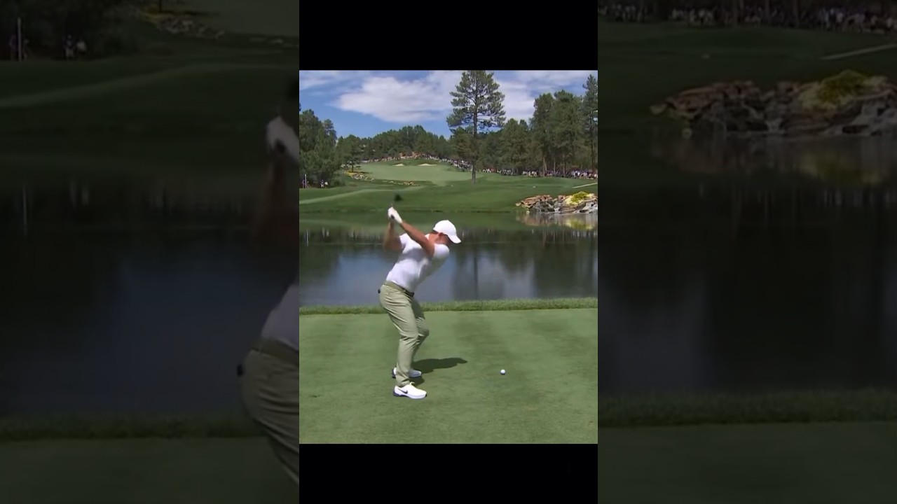 Rory Mcilroy throws his club in the water