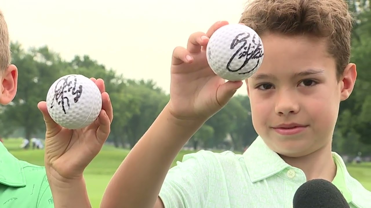 Funny, young golf fans score Rickie Fowler's autograph at Detroit's Rocket Mortgage Classic