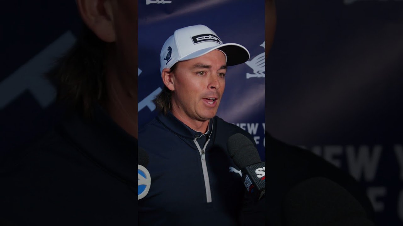 Rickie Fowler and Eli Manning take swings at a golf simulator