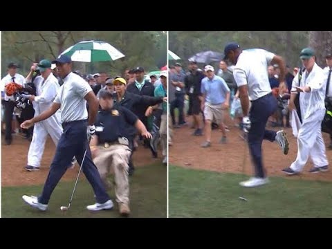 Tiger Woods was tackled by Masters security guard and limped away from scene