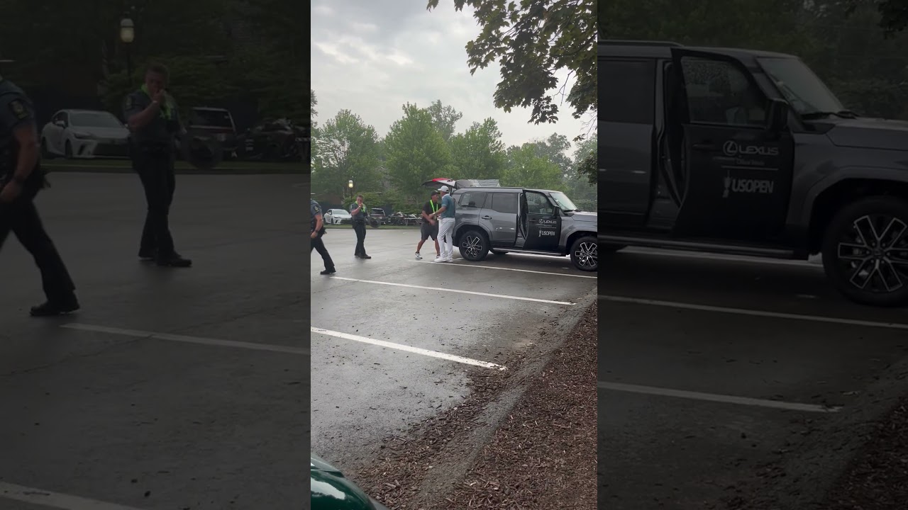 Phil Mickelson missed the cut but still made time in the rain to hand out gifts to the officers