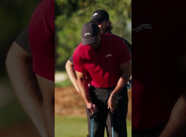 Tiger Woods with the most nonchalant 3-yard flop shot you'll ever see.